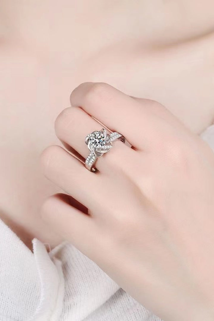 MoissaniteRing, FloralDesign, PlatinumPlated, FineJewelry, FashionAccessory, LuxuryRing, GemstoneRing, ElegantStyle, TrendyJewelry, SpecialOccasionJewelry, StatementRing, PreciousGemstones, UniqueDesign, GlamorousAccessories, SparklingRing, ClassicElegance